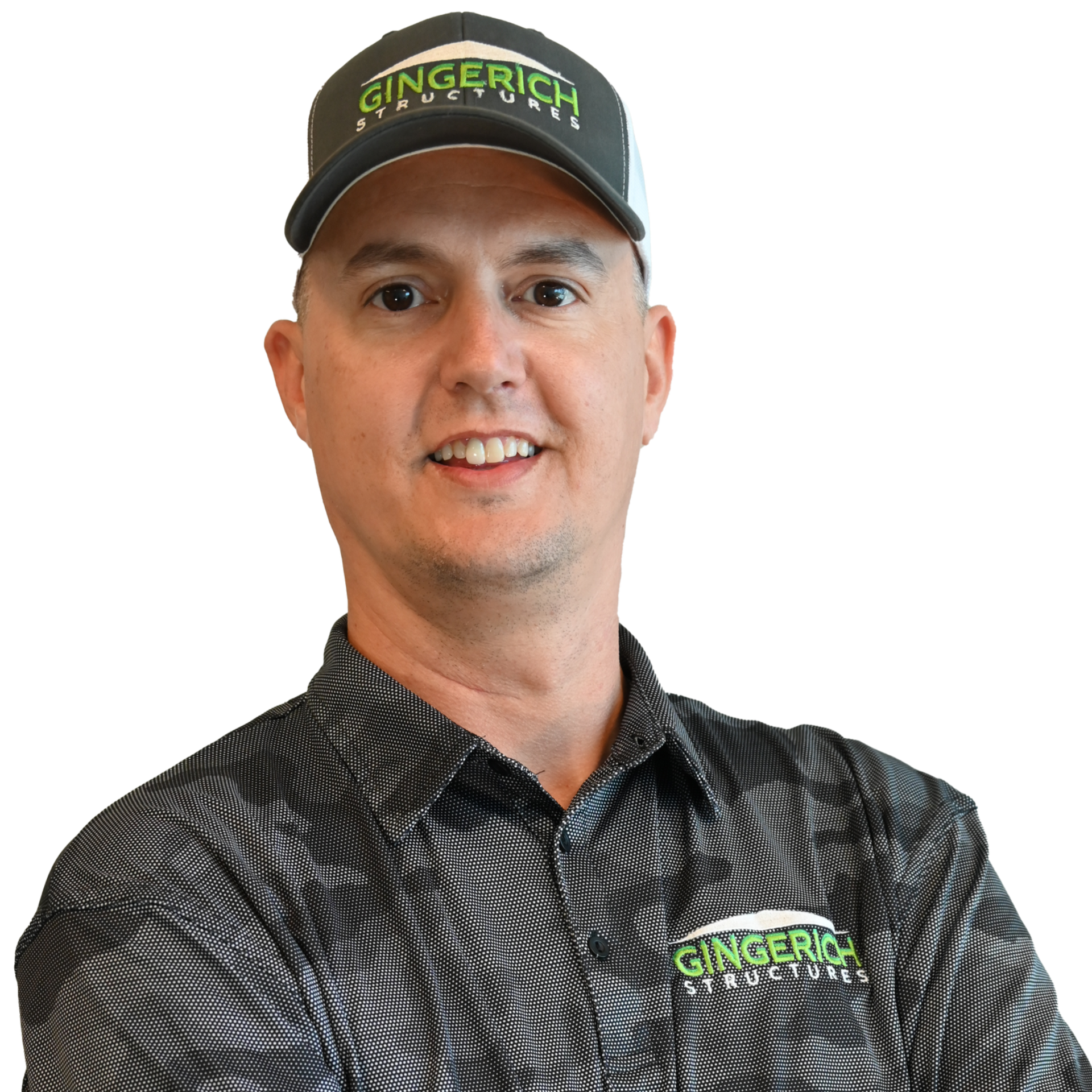 Man wearing a hat and shirt with company logo, smiling.