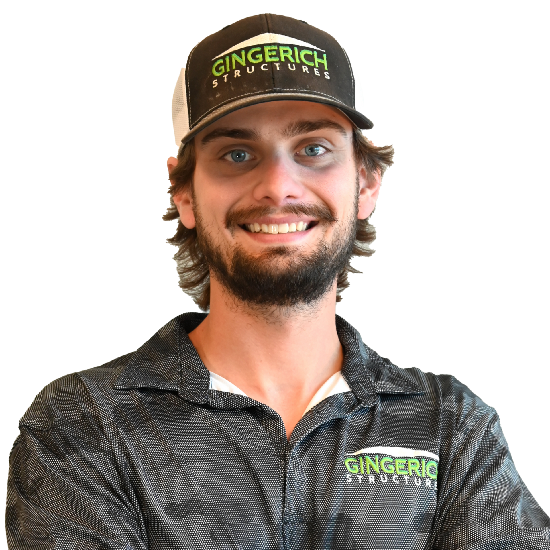 Man wearing a Gingerich Structures hat and shirt, smiling.