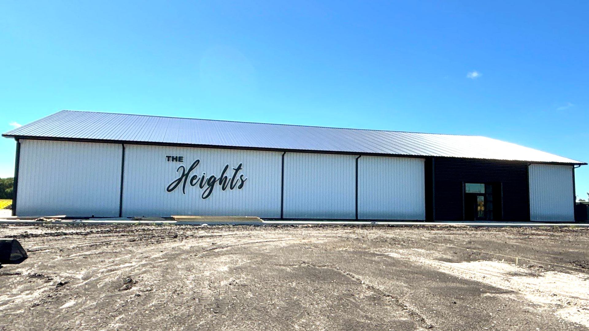 White event hall with black lettering