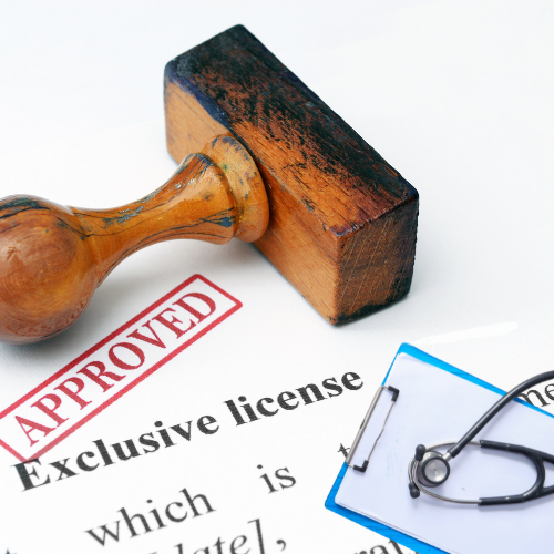 A stamp on a piece of paper that says approved