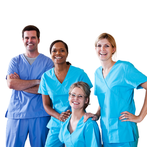 A group of people wearing blue scrubs are posing for a picture