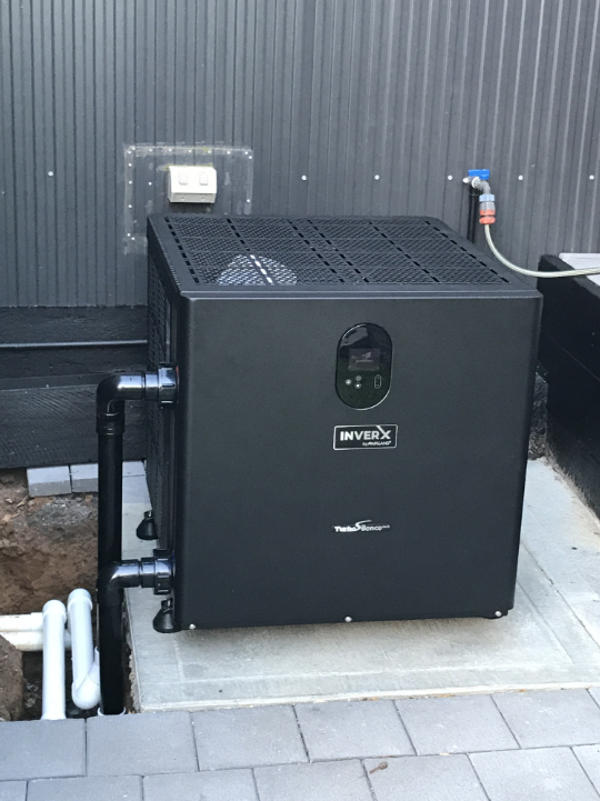 A Black Box With a Hose Attached — Newcastle Solar Pool Heating Systems In Elermore Vale, NSW