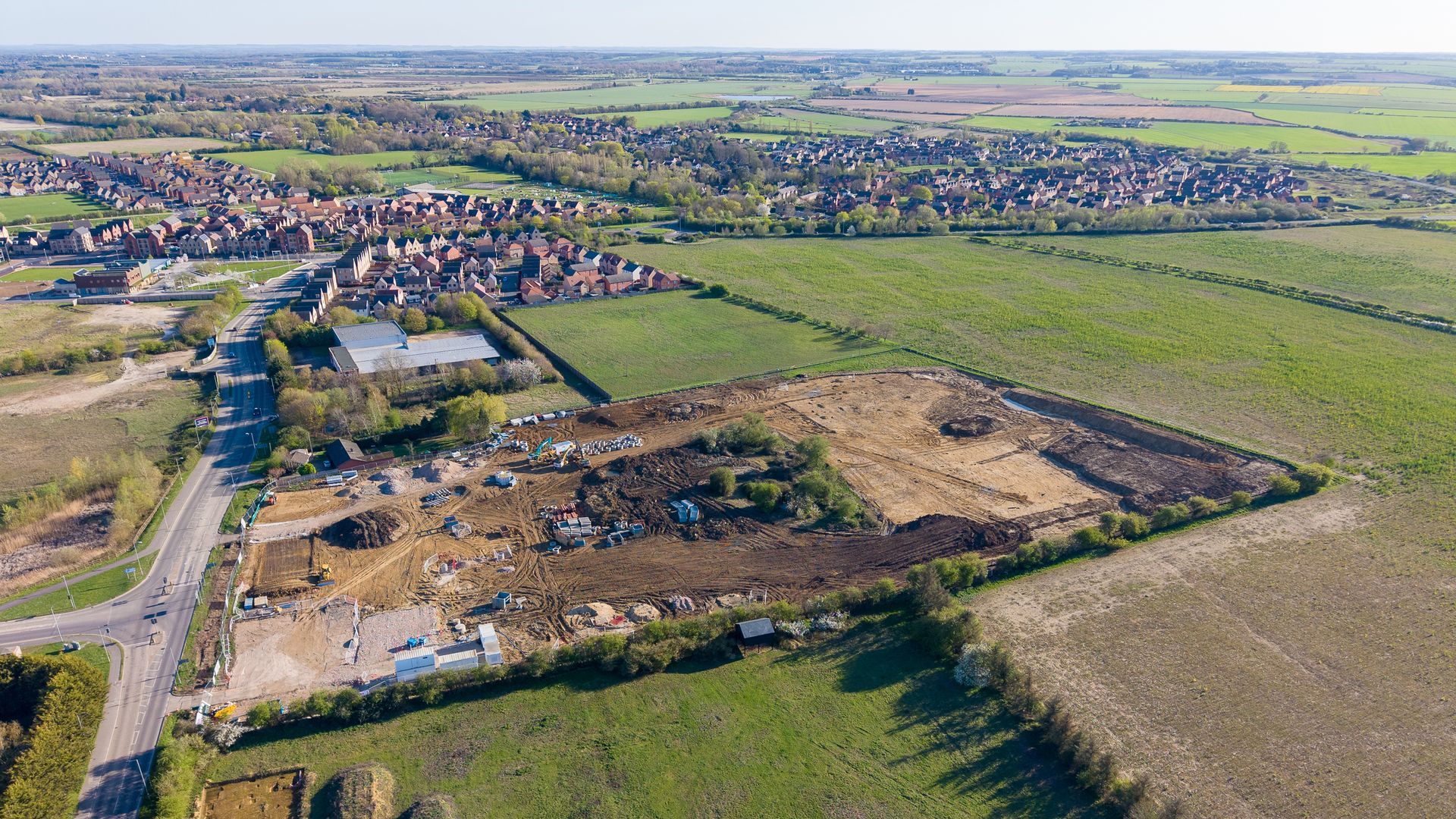 Drone view of Bellway Hatton Gate development site in Northstowe during groundworks stage
