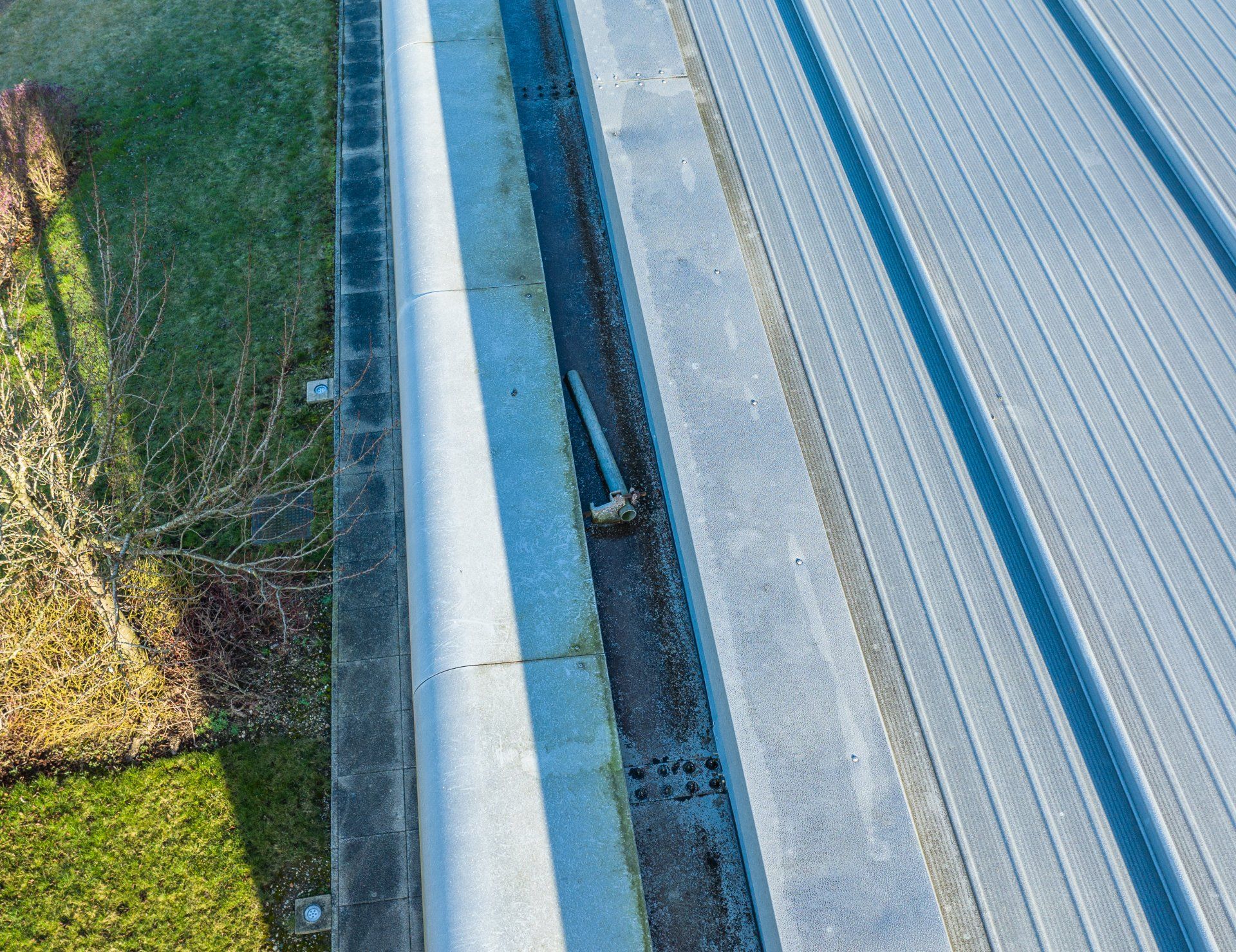 Drone roof survey finds scaffold pole in guttering