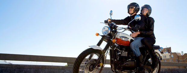 Couple On A Motorcycle — Minden, LA — McInnis Insurance Agency, Inc.