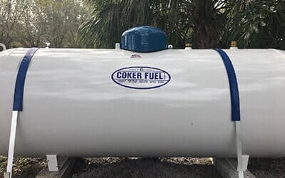 Man closes a knob on a propane tank — Fuel Company in Sebring, FL