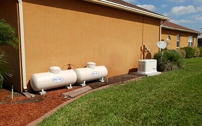 Small propane tank connected in a cage — Fuel Company in Sebring, FL