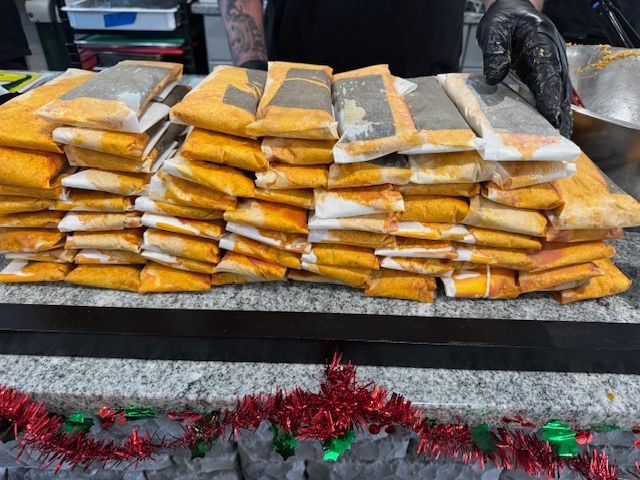 A stack of food sitting on top of a counter.