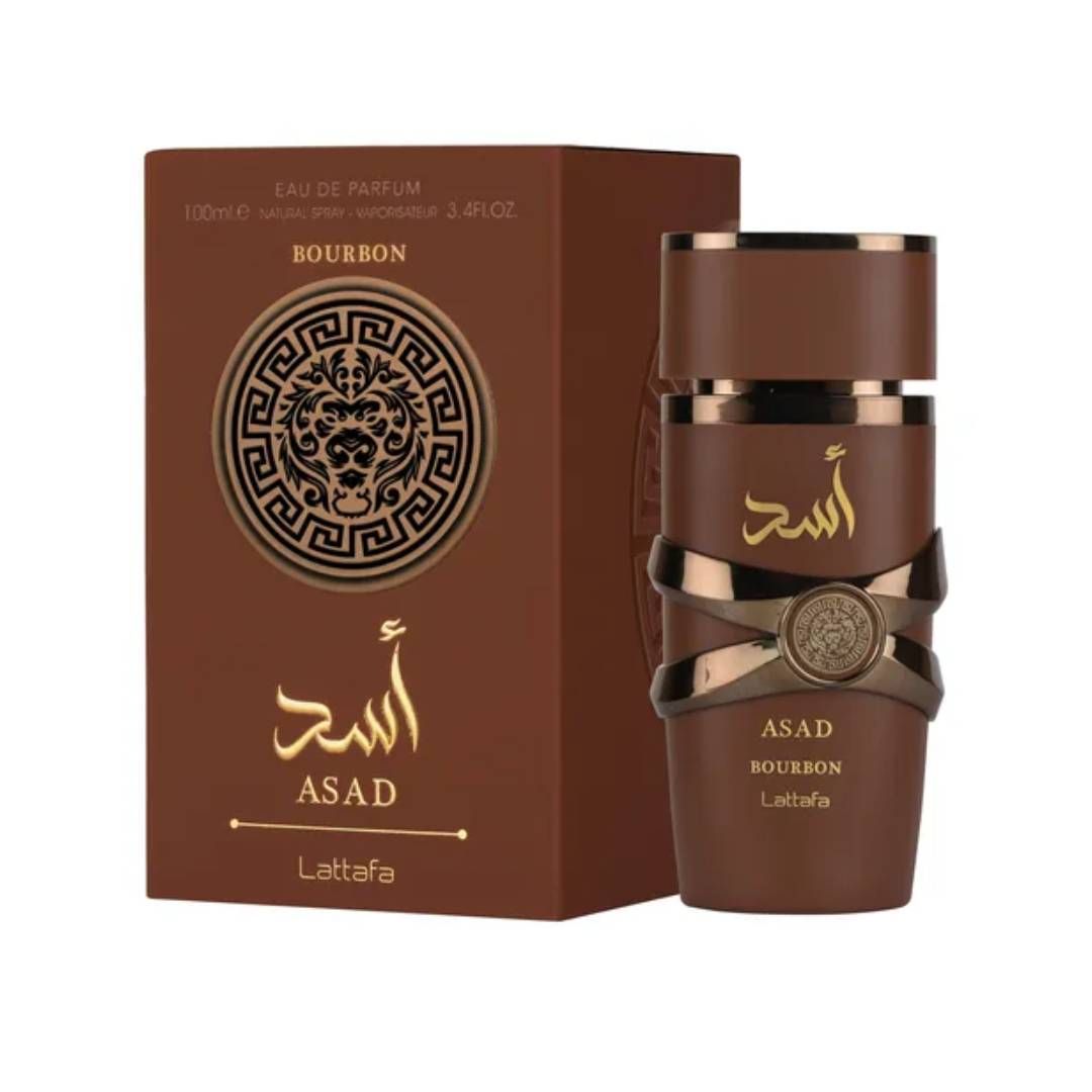 Una botella de perfume Asad al lado de una caja.