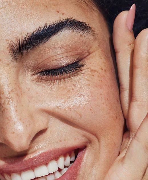 A Close Up of a Woman's Face With Her Eyes Closed — SKN Gold Coast in Southport, QLD