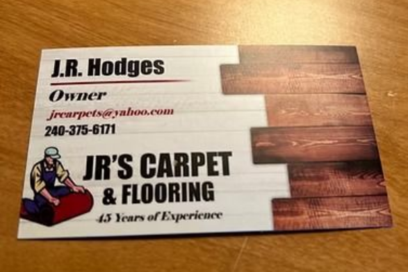 Business card for J.R. Hodges. It has a logo with a worker, 45 years of experience, and contact info.