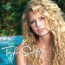 Taylor Swift album cover, blonde curly hair, blue background, floral elements.