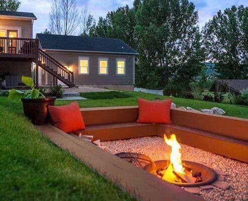 how far should your backyard fire pit be from your house?