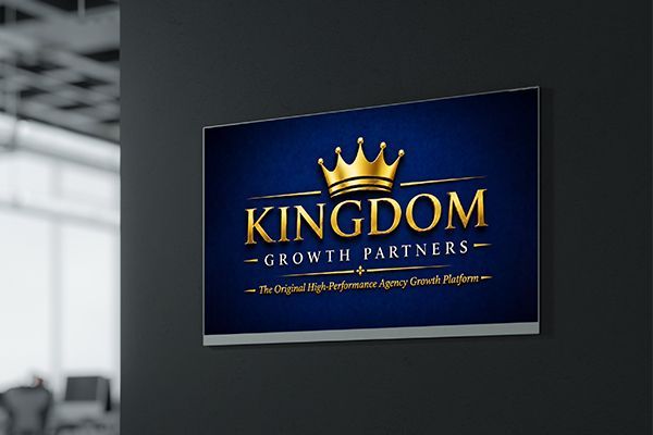Blue wall sign reading “KINGDOM GROWTH PARTNERS” with a gold crown logo