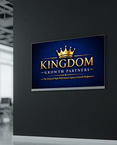 Dark wall sign with a gold crown logo and the words “Kingdom Growth Partners” on a navy background