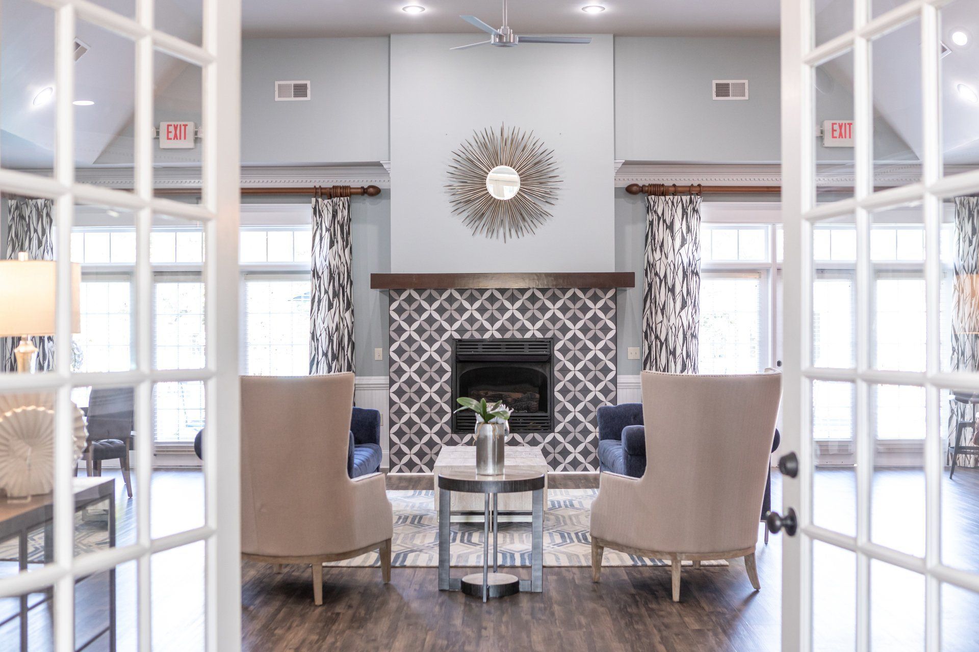Seating with Fireplace In Lobby | The Stratford at Hillcrest Towne Center Apartments