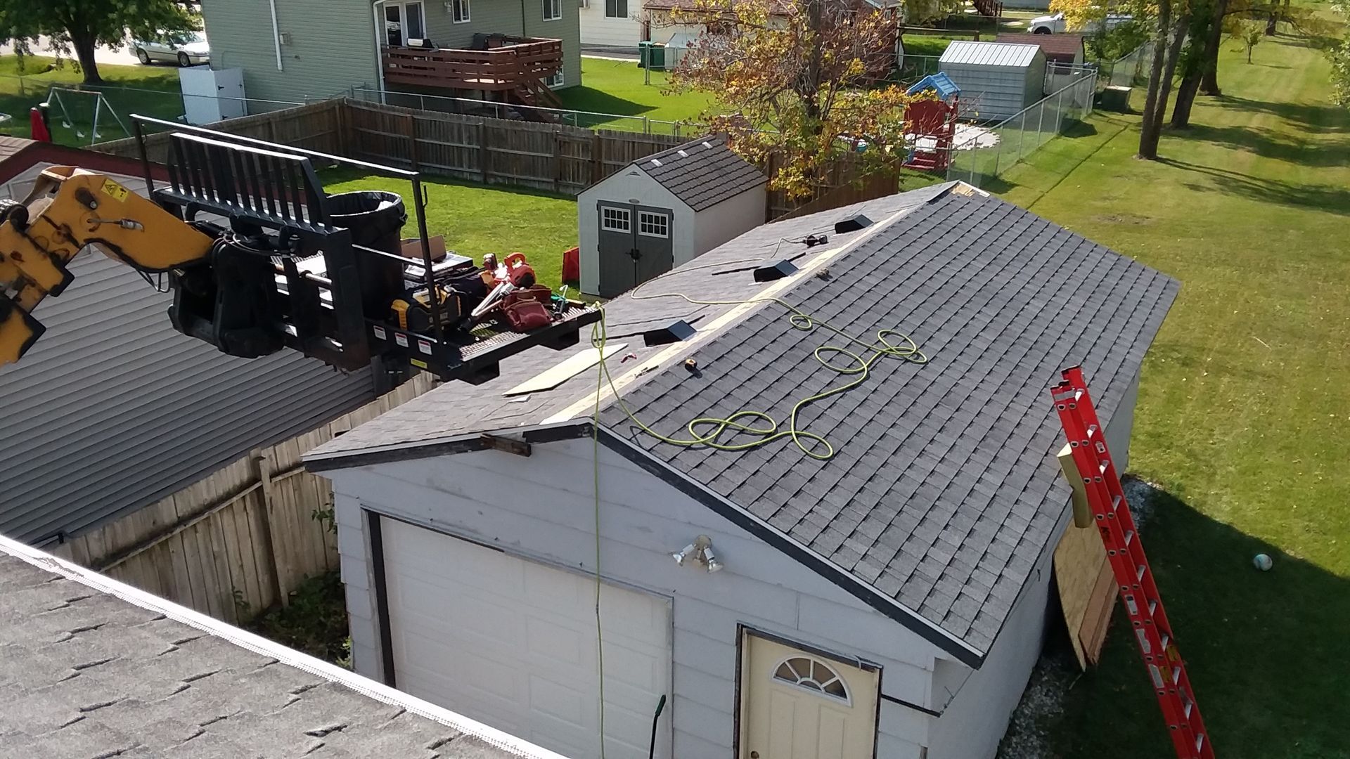 Architectural Shingles with Box Exhaust Vents Installed on a Detached Garage Roof in Lake Park, MN