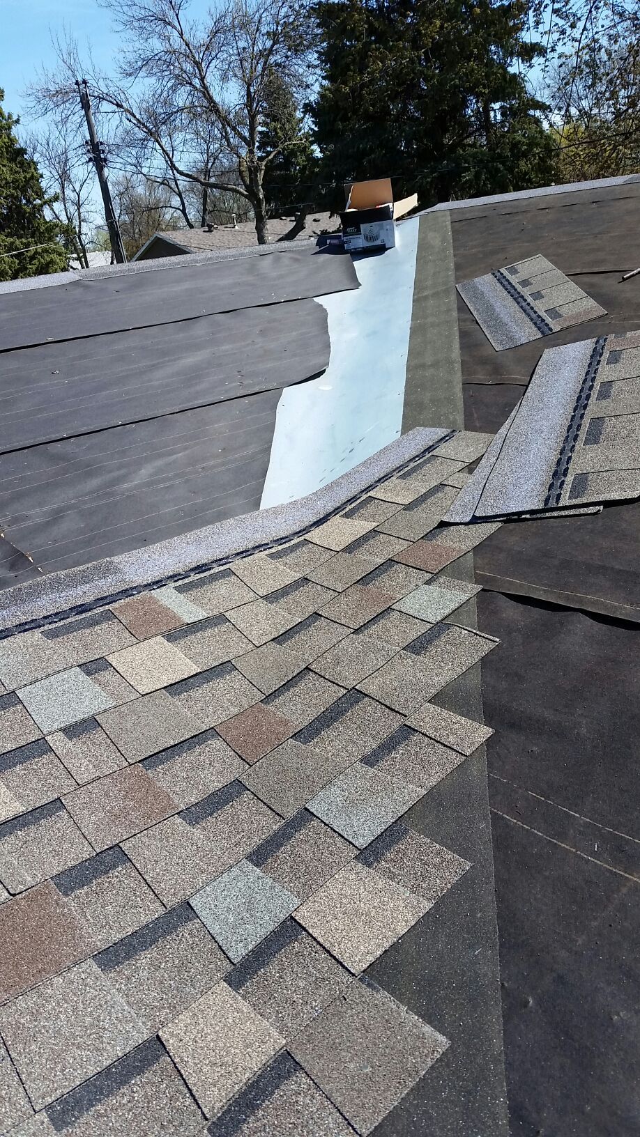 Roof Valley with Metal Liner and Briarwood Majestic Colored Shingles Halfway Completed in Hankinson-ND