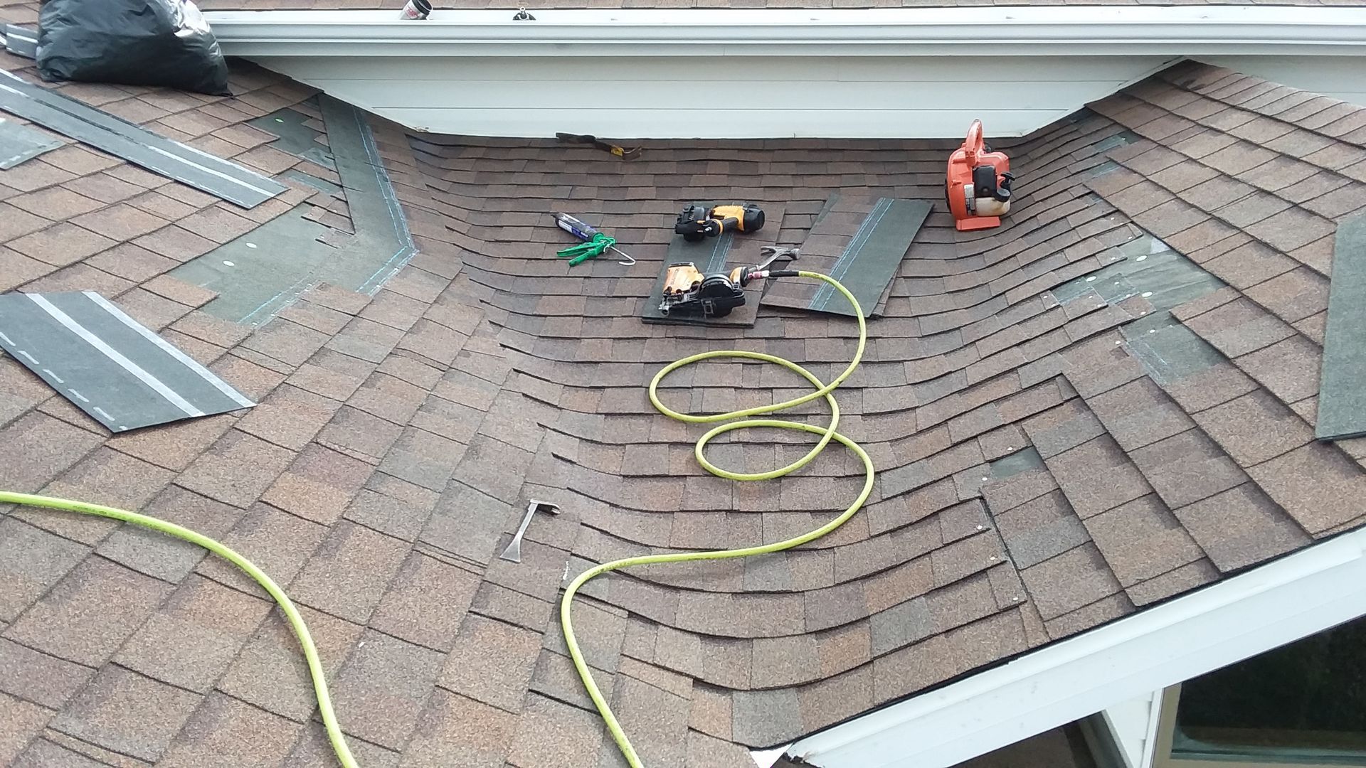 Dead Roof Valley being Repaired with New Shingles in East Grand Forks, MN