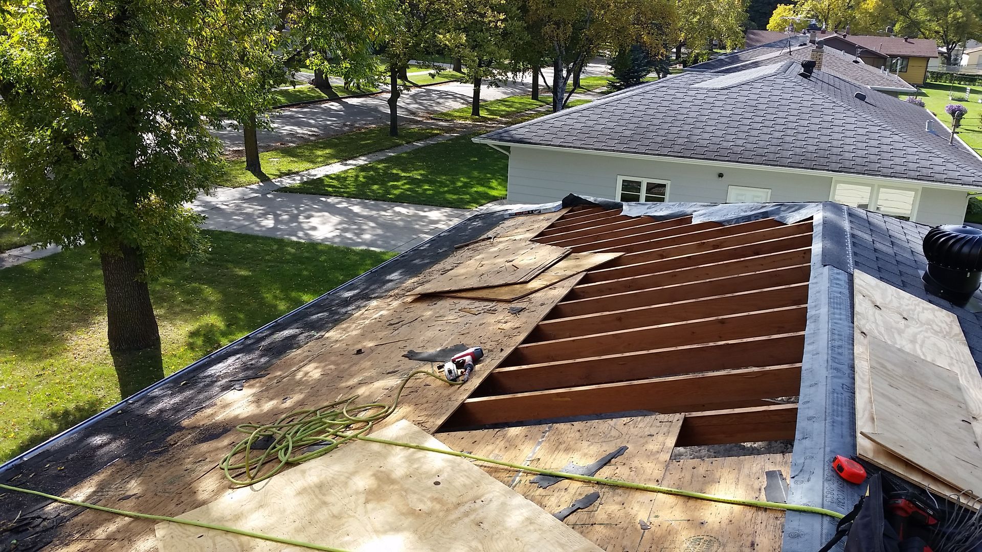 Dry Rot Roof Decking Being Replaced on a Hip Framed Home in Cass-County-ND