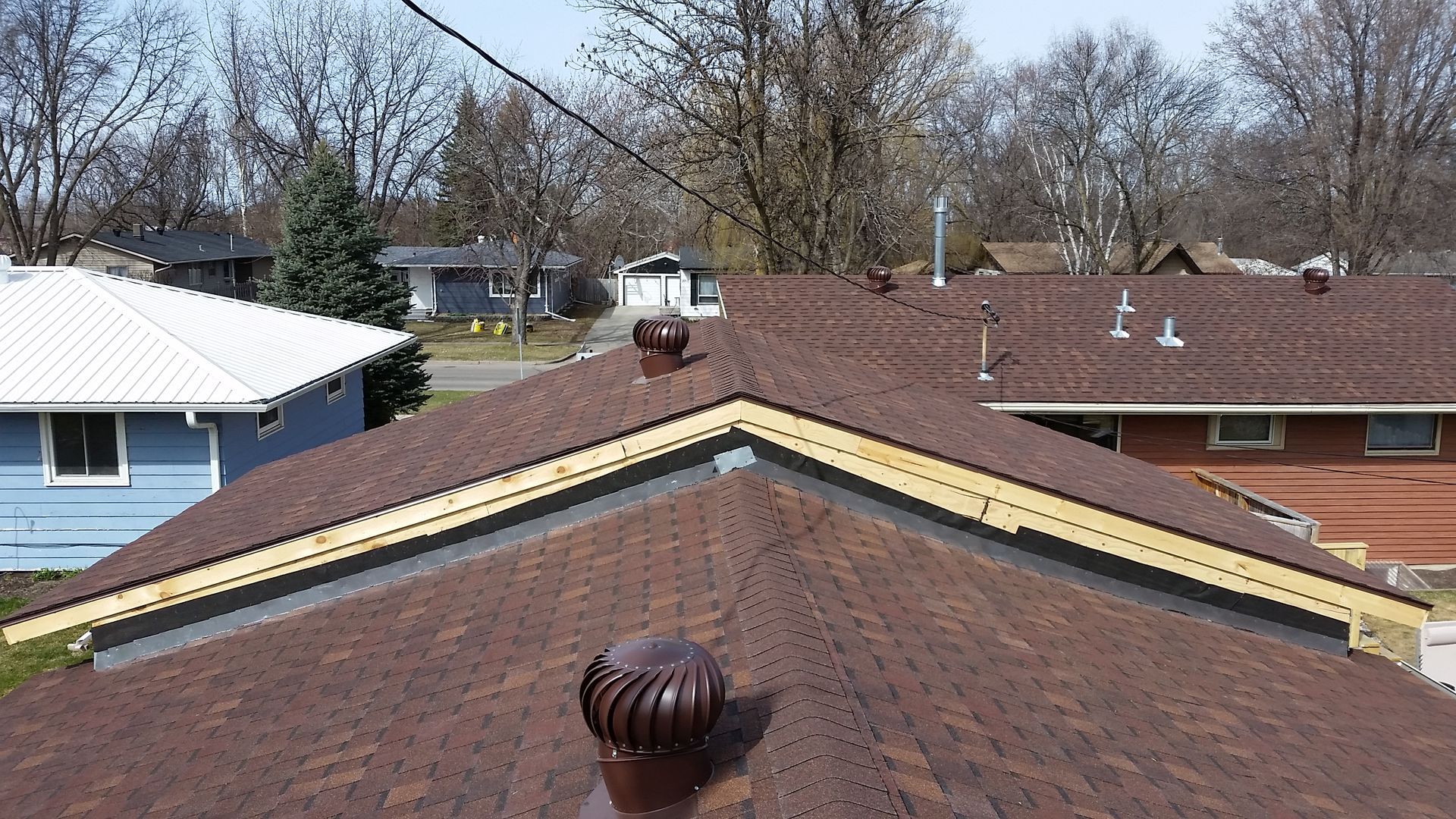 Detached Garage with New Wall Step Flashing, Shingles, and Whirlybird Vents in Climax-MN