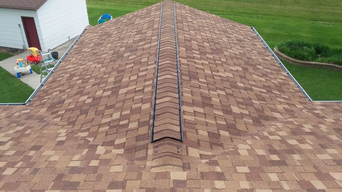 CertainTeed Shingle Roof with Lomanco Low Profile Ridge Vent Installed near Crookston, MN