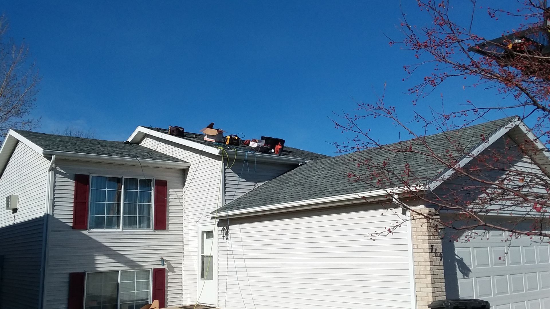 Roofing Tools on a Recently Completed Roof using Atlas Castlebrook Hearthstone Gray shingles in Walcott, ND