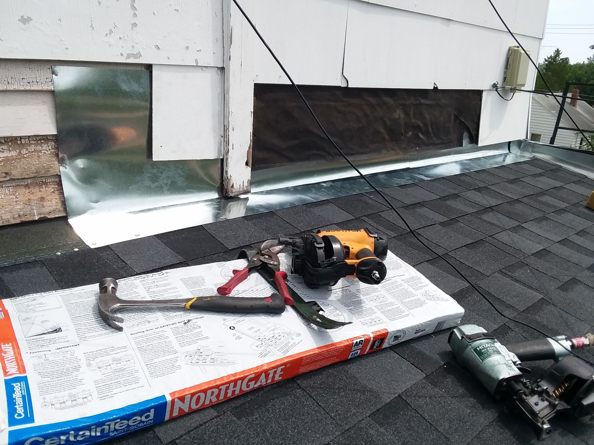 Metal Endwall Flashing, Roofing Tools and CertainTeed Northgate Shingle Bundles in Harwood, ND