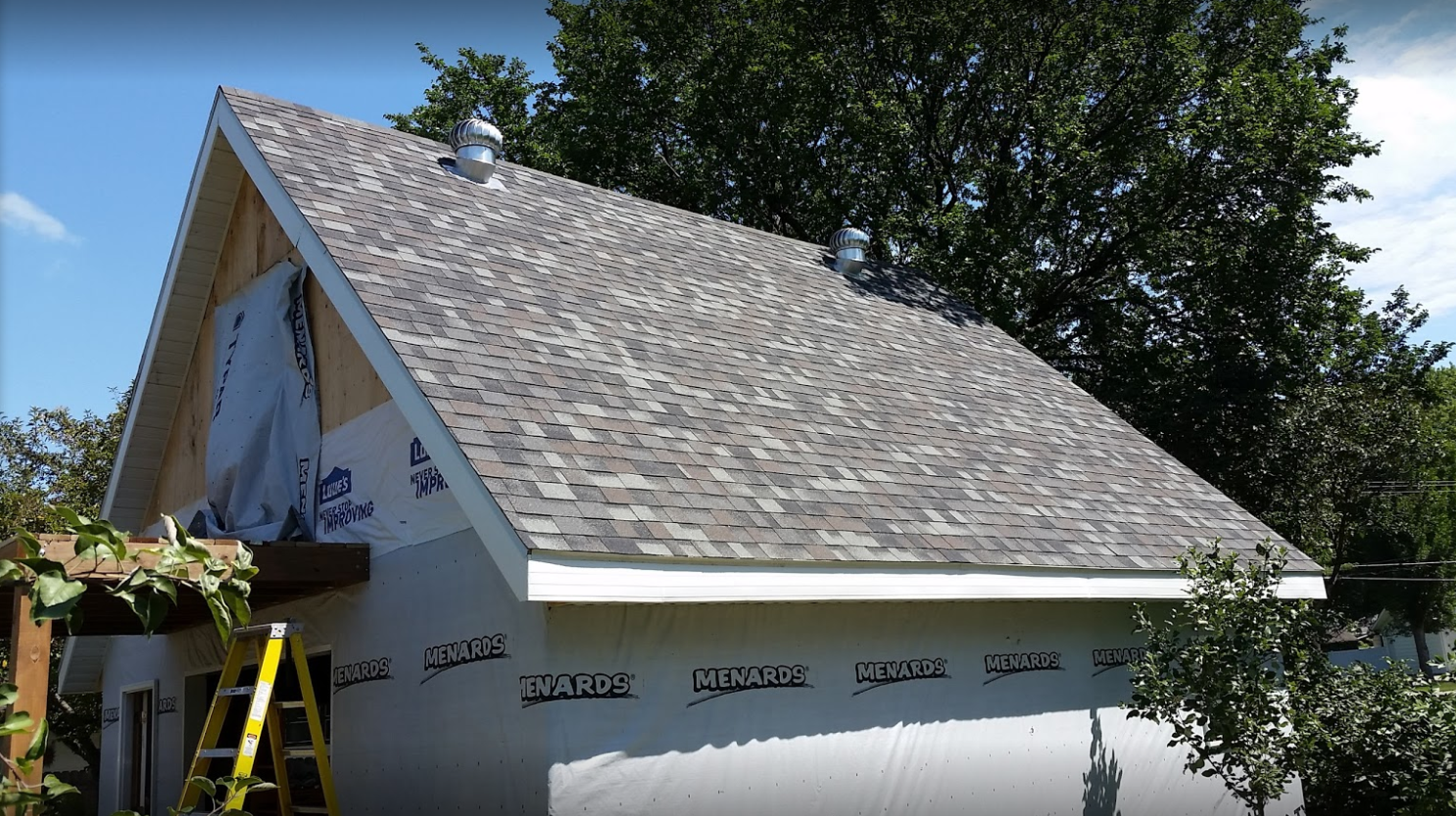 Owens Corning Roofing Shingles and Two Turbine Vents Installed on a Detached Garage near Alice ND