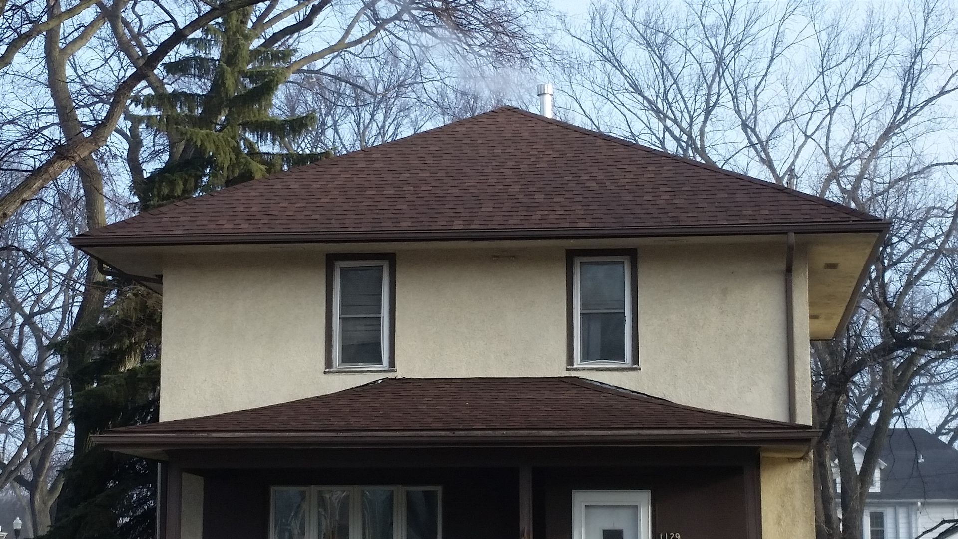 Front side House showing Porch and 2nd Story Roof Work Installed in Wolverton-MN
