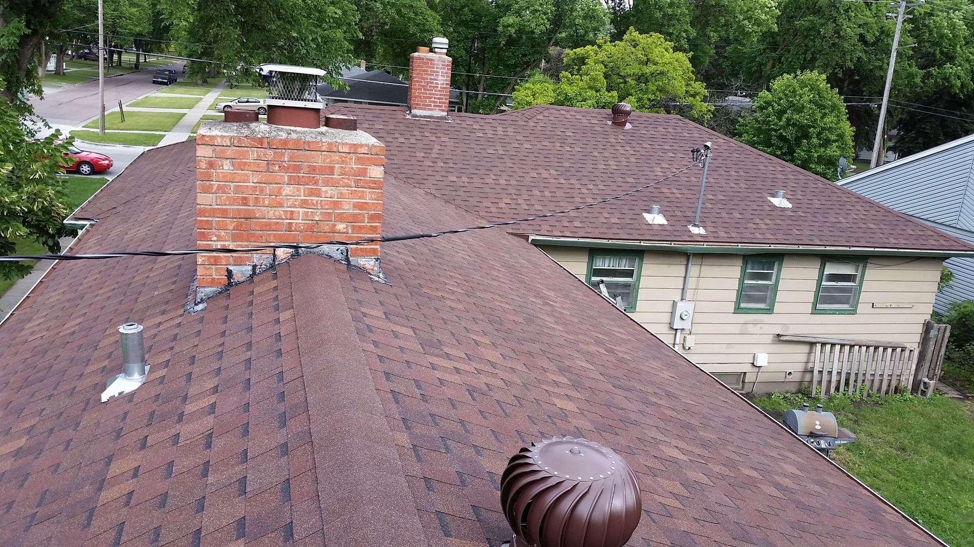New shingles on a home with a Chimney and Exhaust Vents in Elizabeth, MN