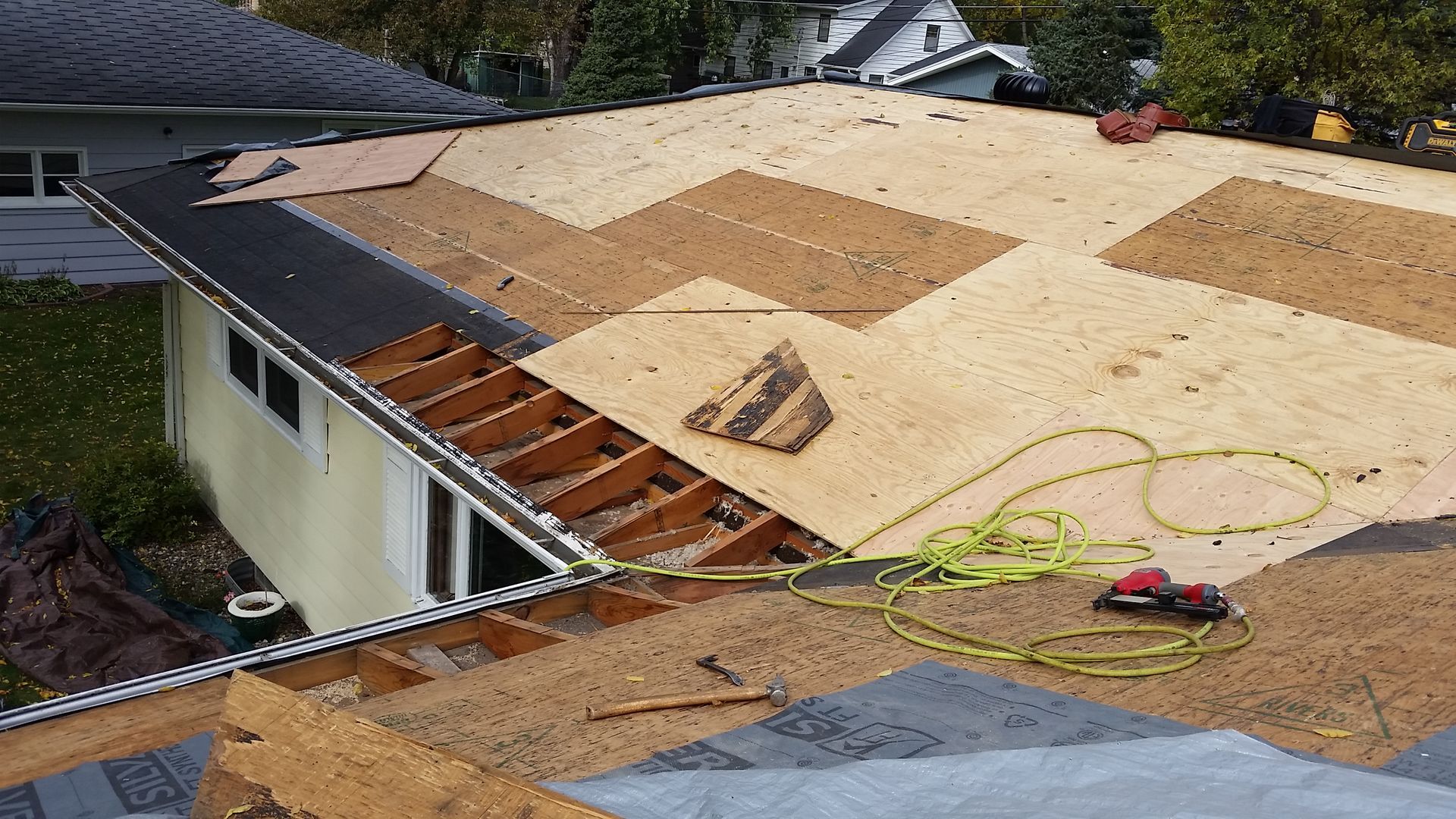 Plywood Being Fastened to Roof Rafters on a One Story House in Ransom-County-ND