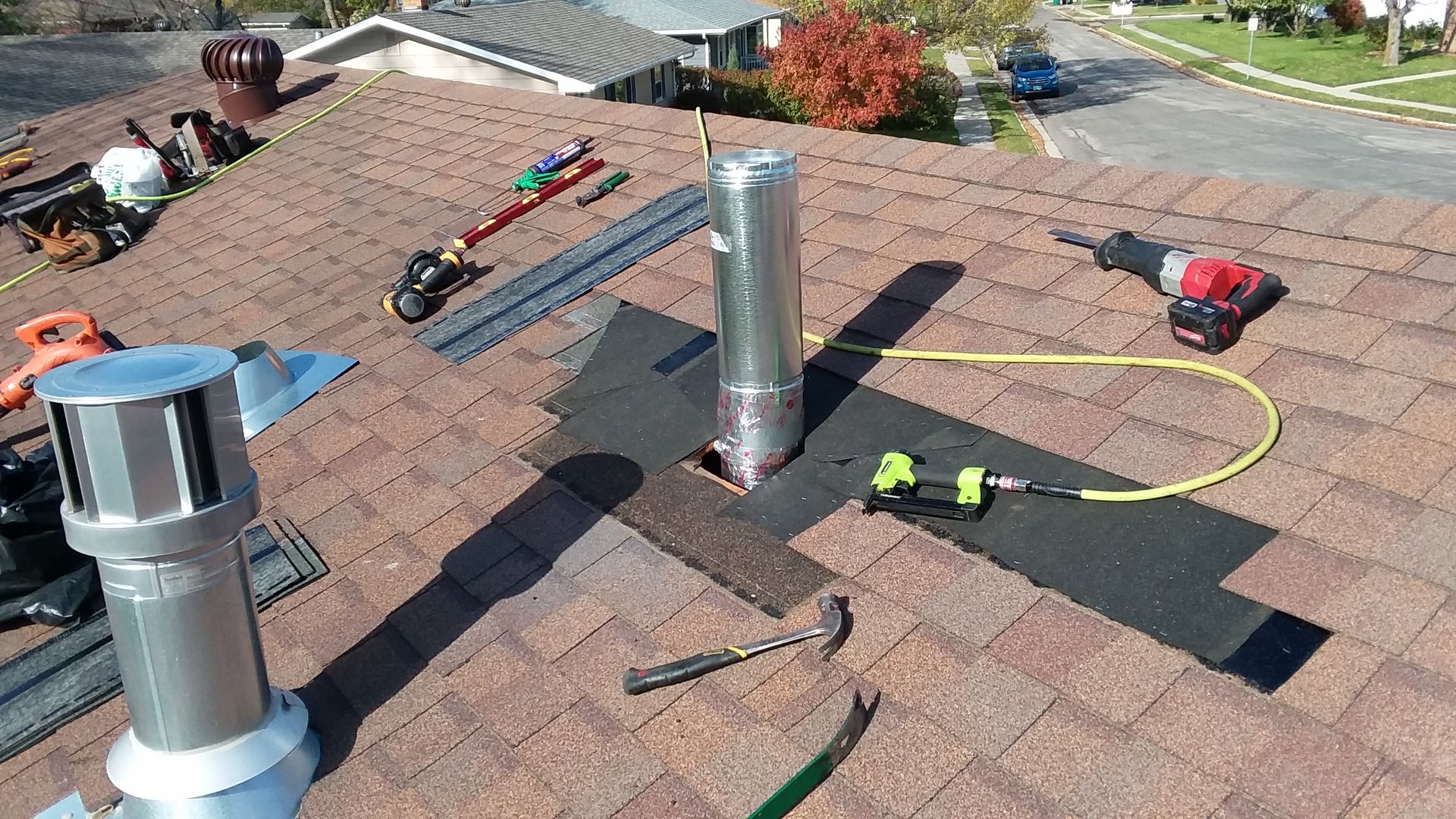Type B Gas Roof Vent Flashing Being Repaired on a one story house near Fargo-Moorhead