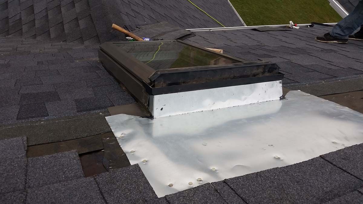 Metal Flashing Hand Bent to Repair a Roof Skylight in Buxton-ND