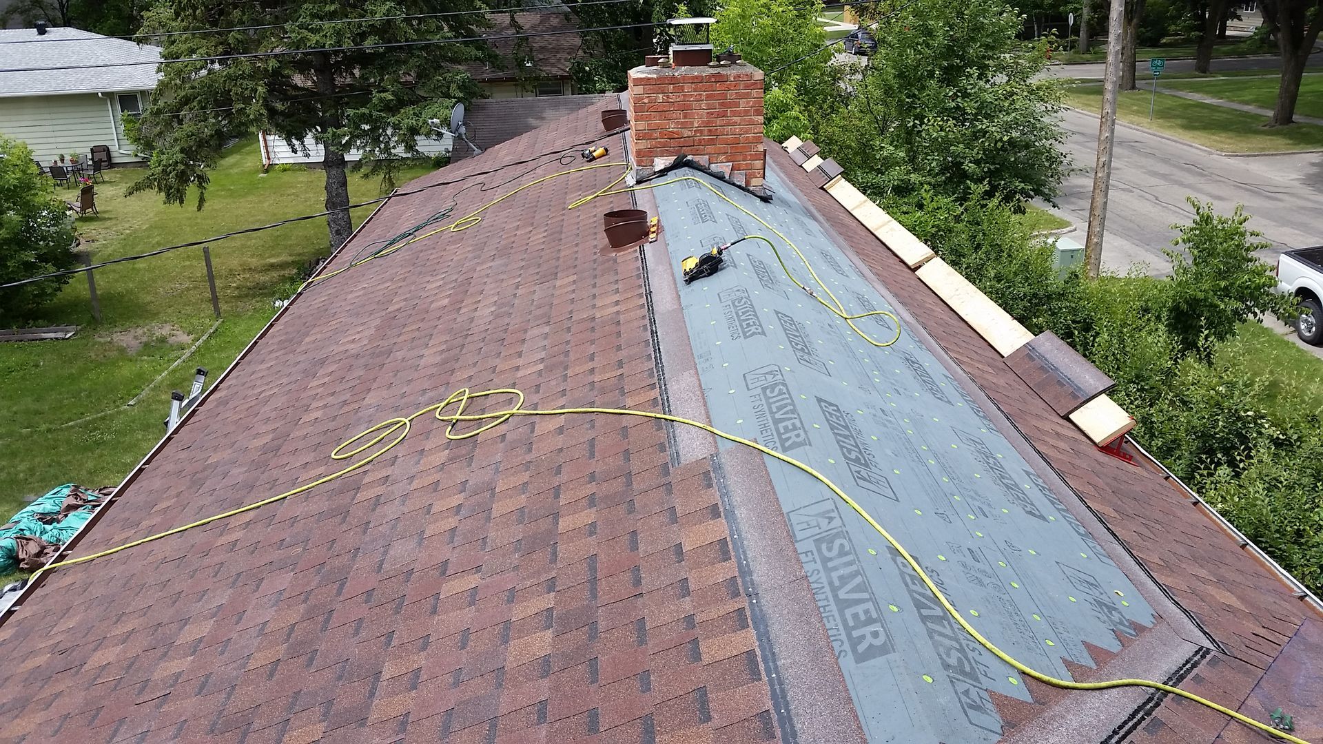 Asphalt Shingles with Gray Felt Underlayment and Roof Safety Jacks on a Roof in Ulen, MN