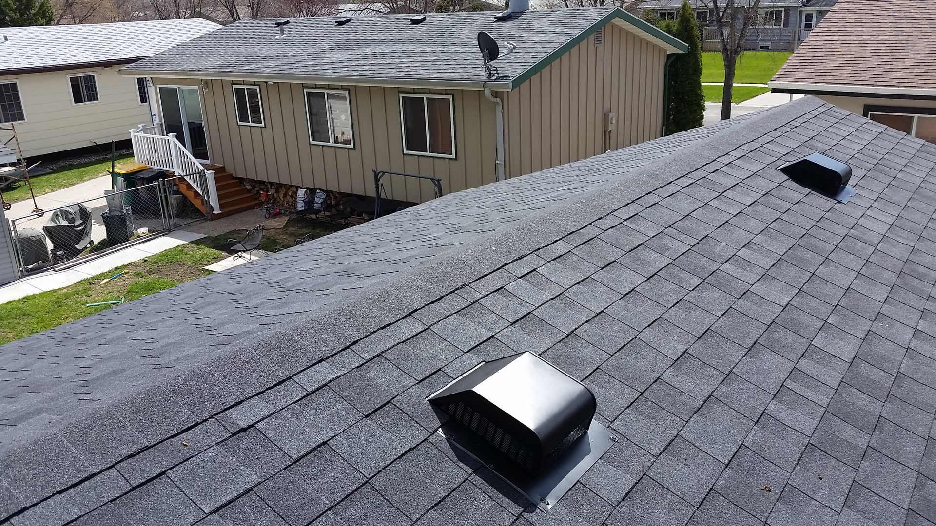 Atlas Brand Black Shadow Shingles Installed with Slant Back Box Vents in Sabin-MN