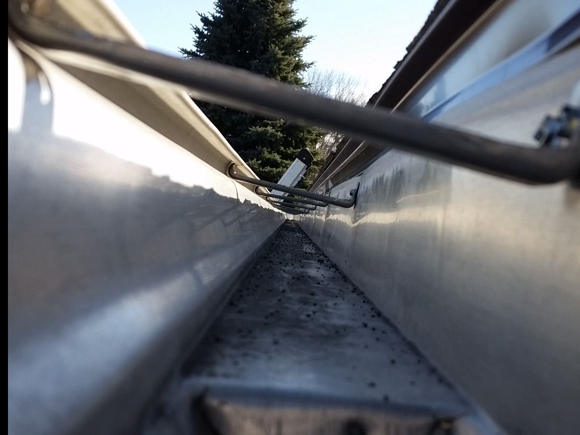 Gutter Cleaned after a Shingle Roof Replacement on a Residential Home in Hope ND