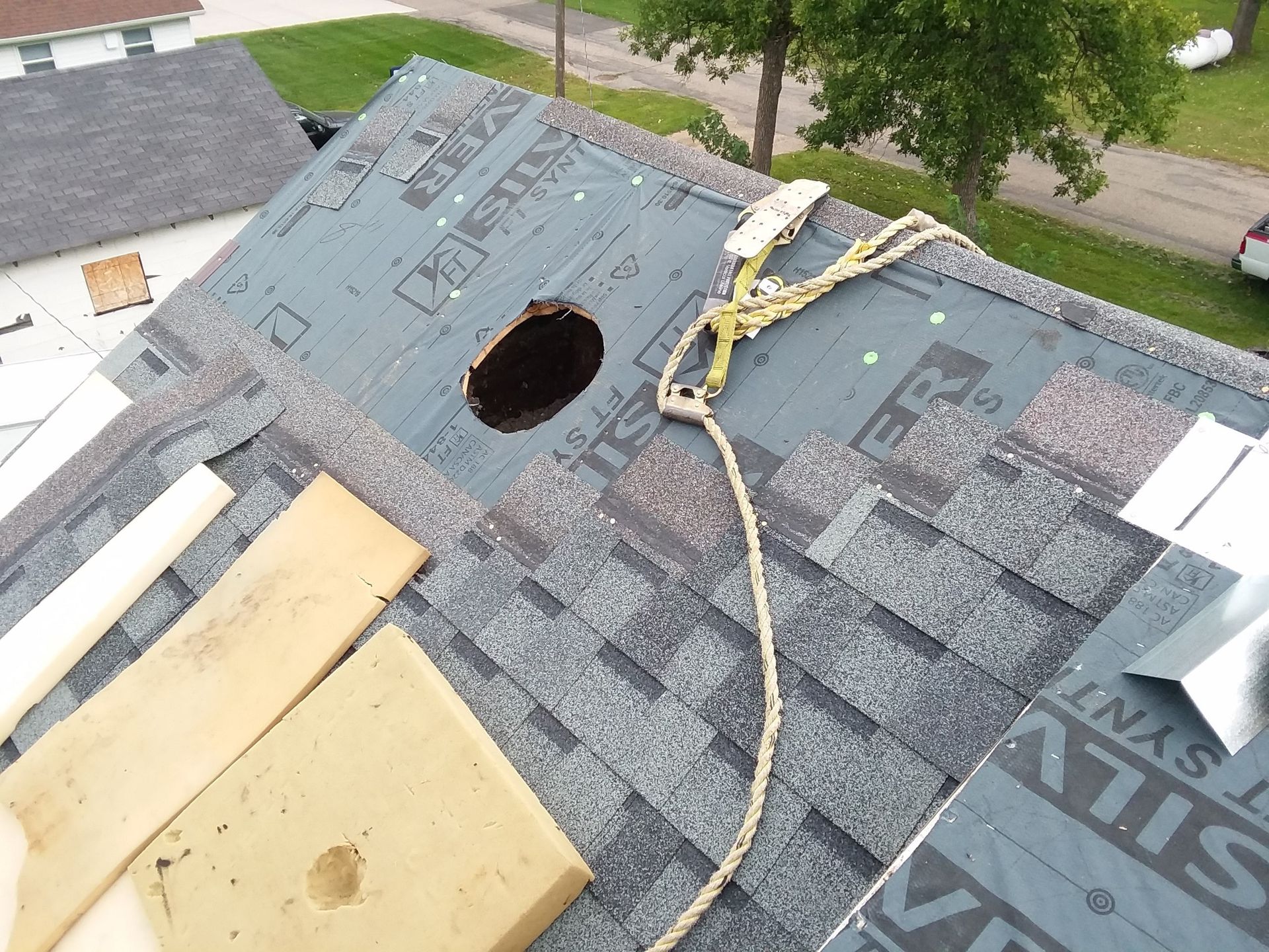 Castlebrook Shingles Installed on a Steep Pitch Roof with Turbine Vent and Step Flashing near West-Fargo-North-Dakota