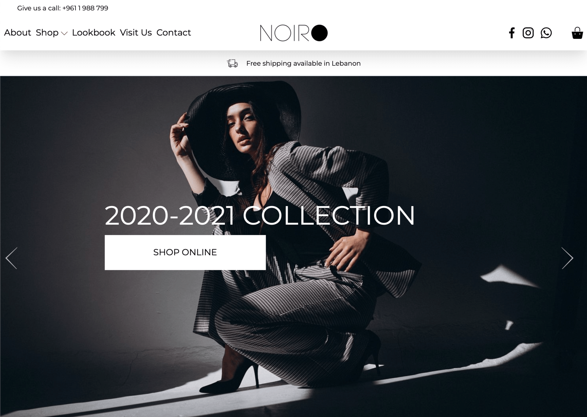 A woman in a hat is sitting on a chair in front of a 2020-2021 collection advertisement.
