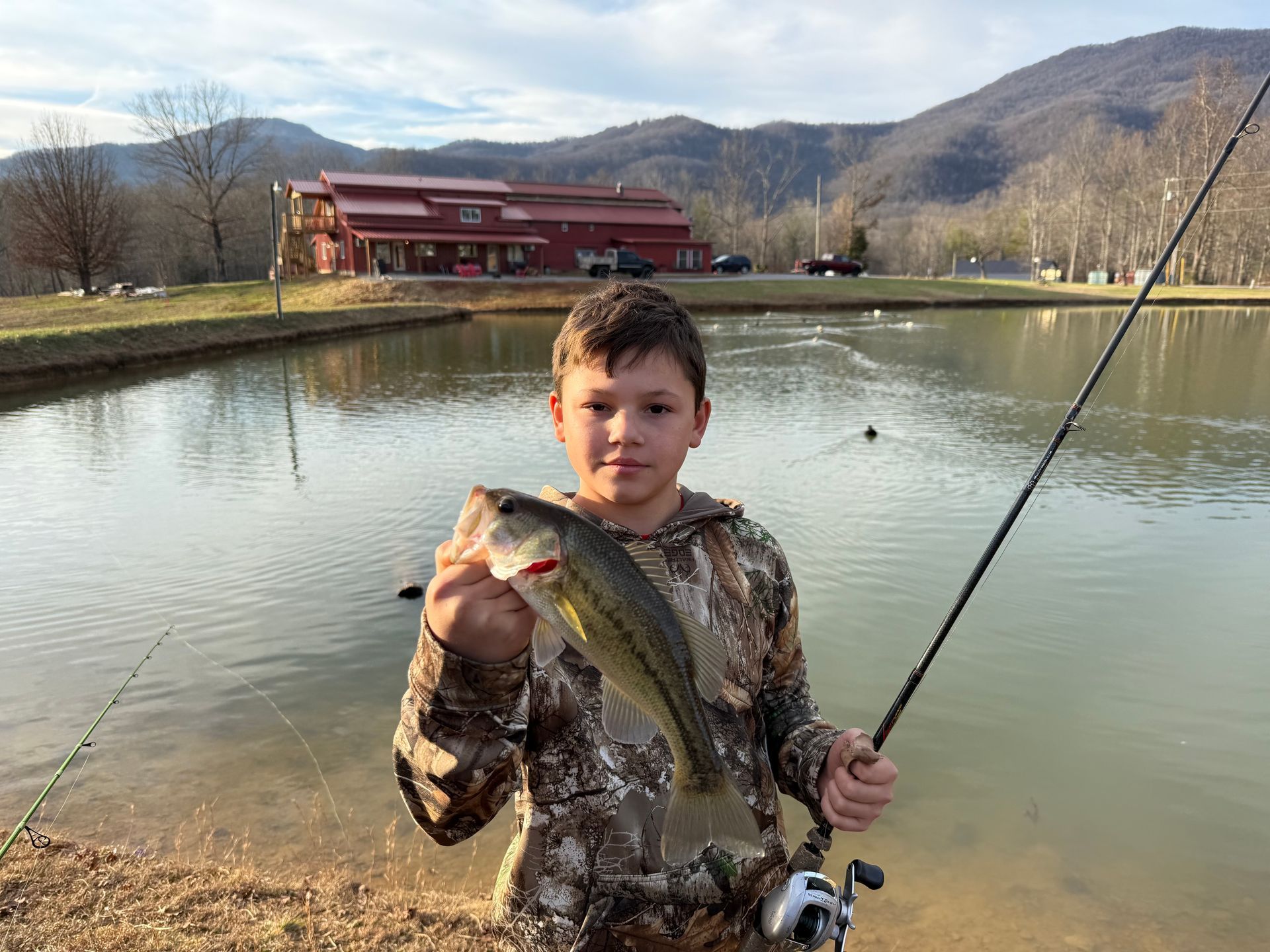 A map of a campground with a lake in the middle