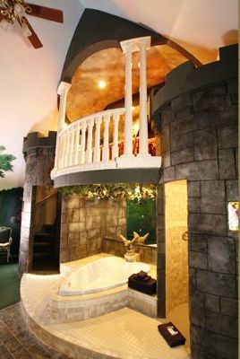 A bathroom in the shape of a castle with a jacuzzi tub