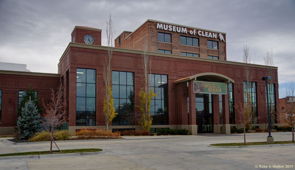 A large brick building with a sign that says museum of clean