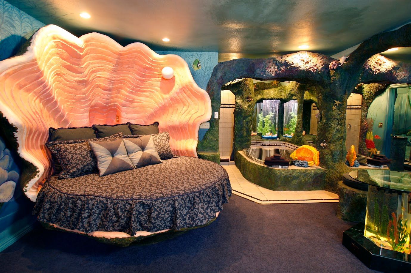 A bedroom with a bed in the shape of a shell