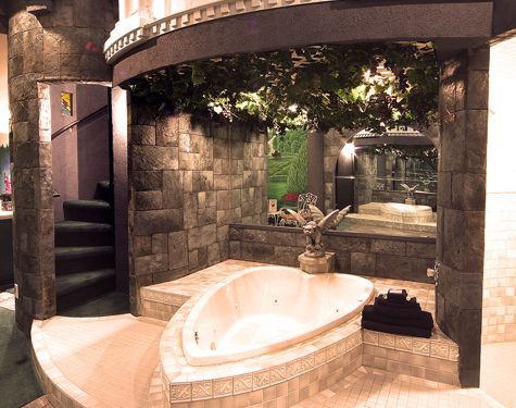 A bathroom with a jacuzzi tub and stairs