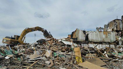 Excavator in Building Debris — Indianapolis, IN — W R Beach, Inc.