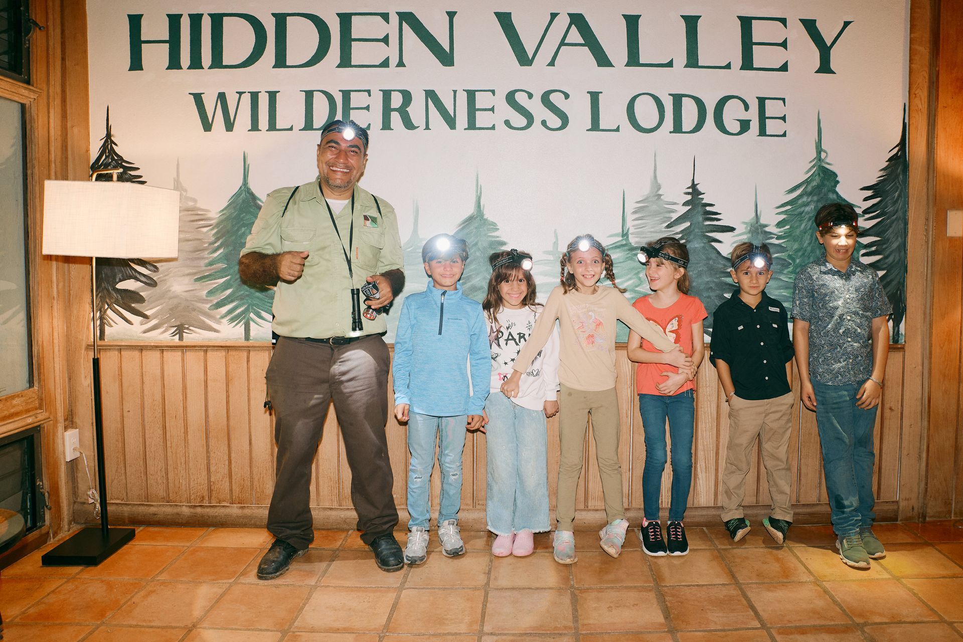 A group of kids poses for their Kid's Club Photo