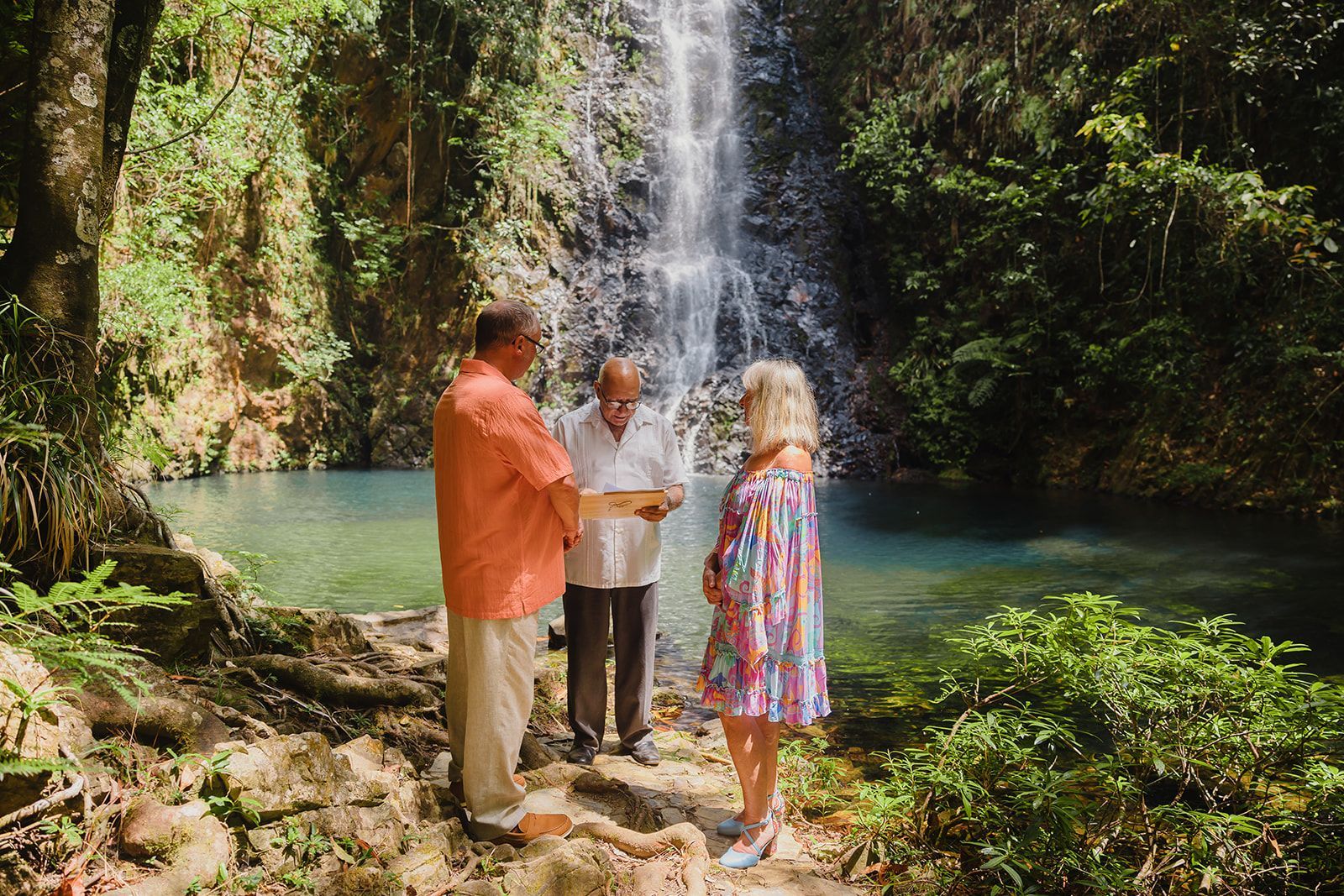 A couple celebrating their love with an intimate wedding surrounded by the natural beauty of Butterfly Falls.