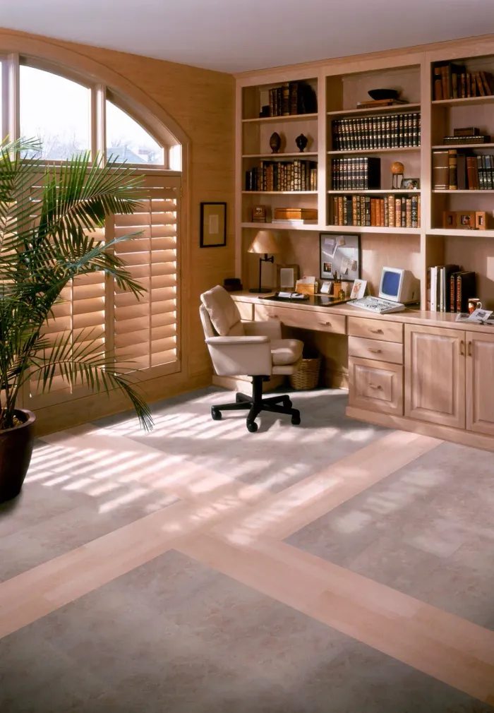 A home office with a desk and a chair