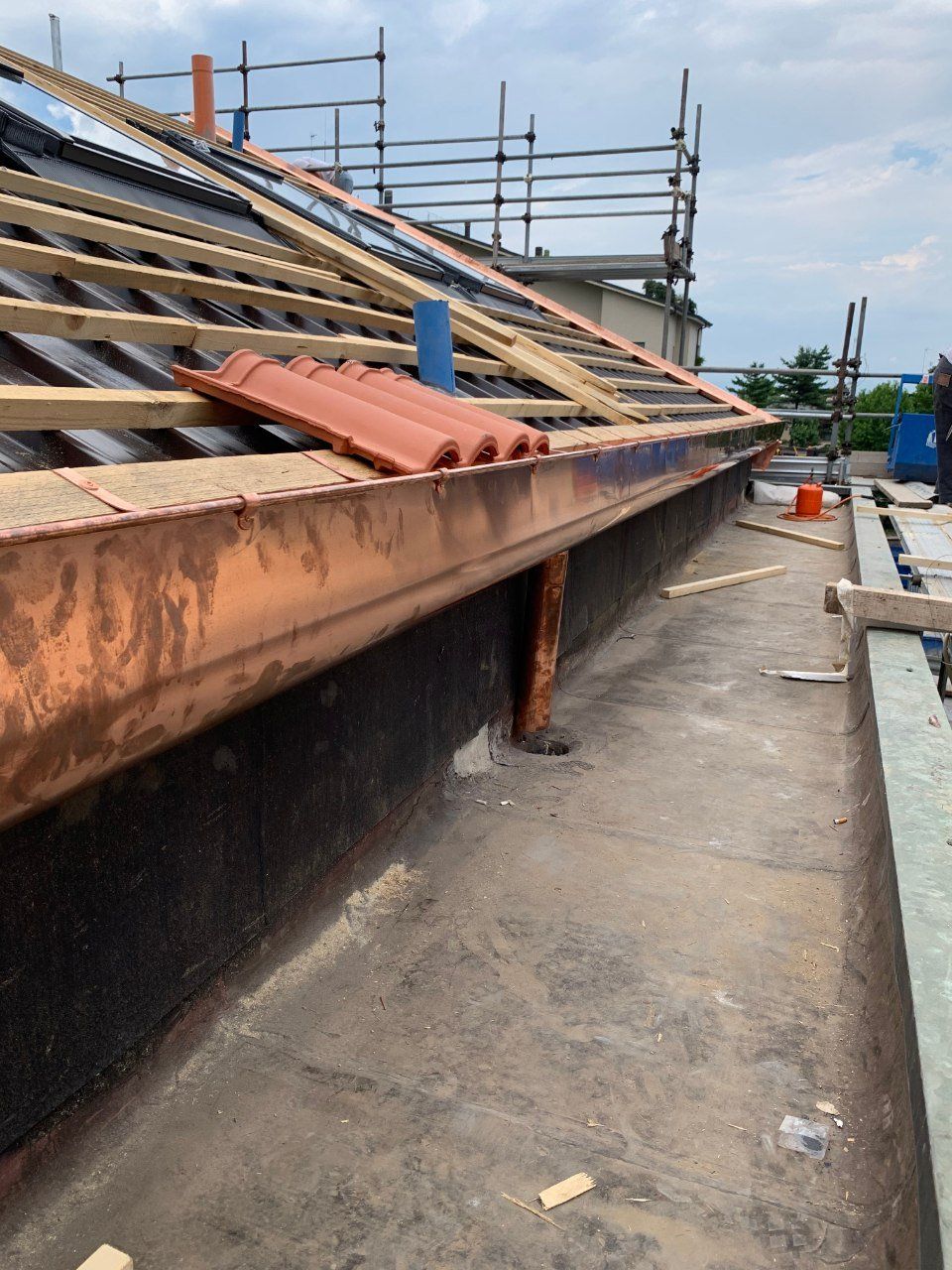 grondaia in rame su una copertura abitativa