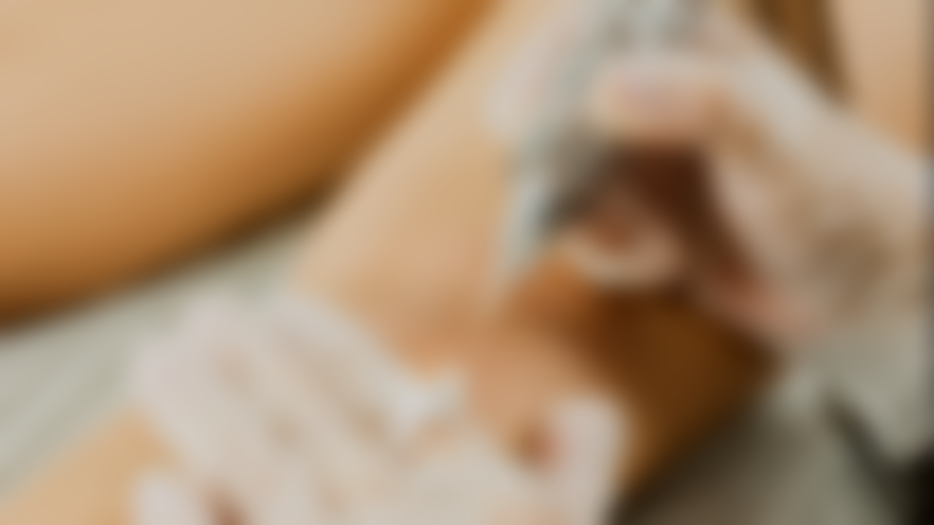 A close up of a person 's hand holding a cell phone.